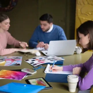 medium-shot-people-working-desk
